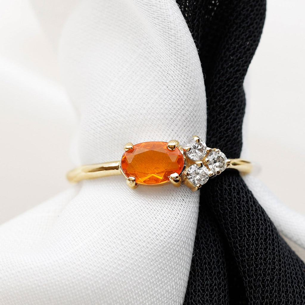 Oval Cut Fire Opal Promise Ring with Diamond Trio