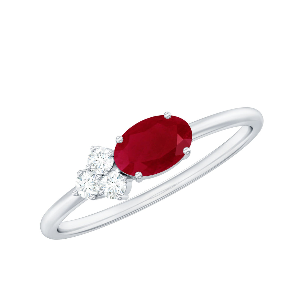 East West Style 0.6 Carat Oval Ruby Promise Ring with Diamond Trio