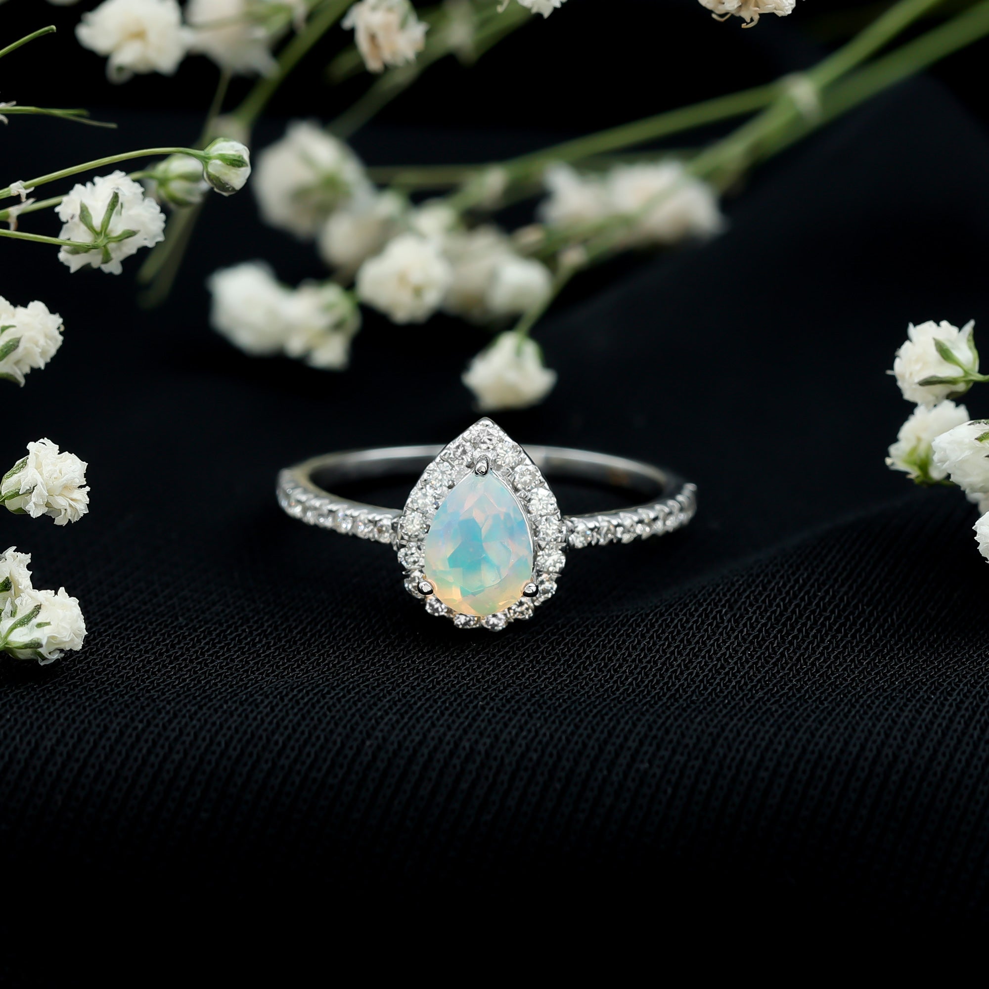 0.7 Carat Natural Ethiopian Opal Teardrop Engagement Ring with Diamond Halo