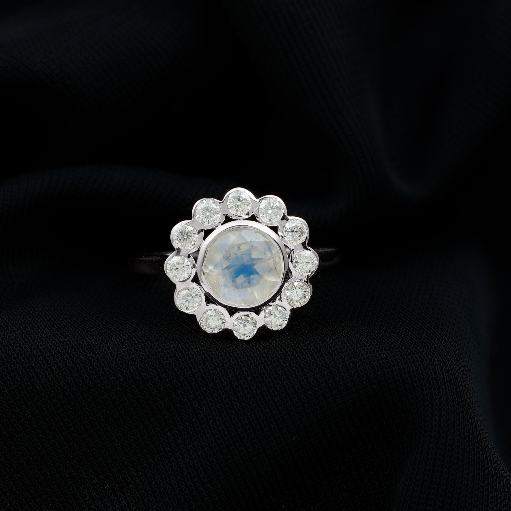 Round Moonstone and Diamond Halo Engagement Ring in Bezel Setting