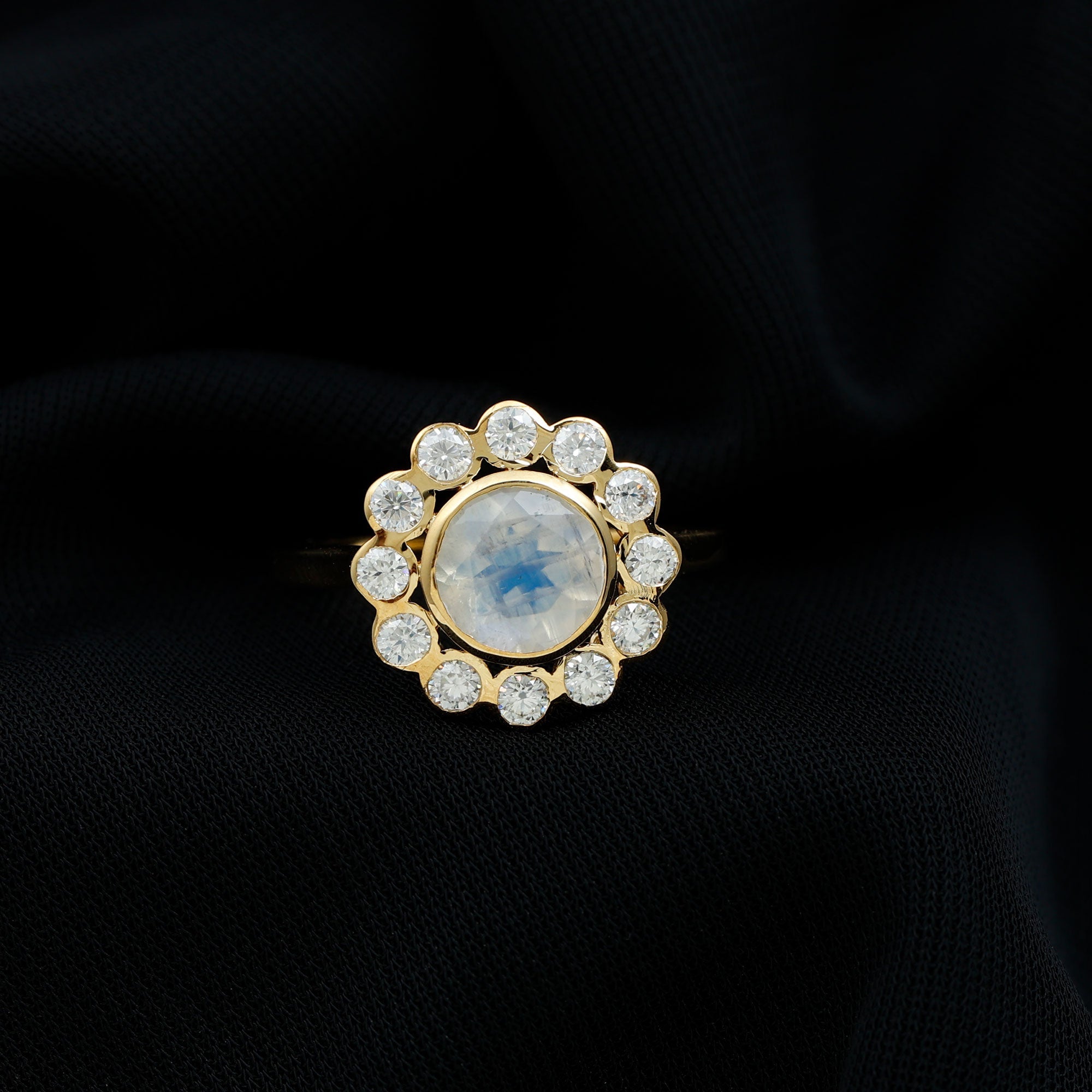 Round Moonstone and Diamond Halo Engagement Ring in Bezel Setting
