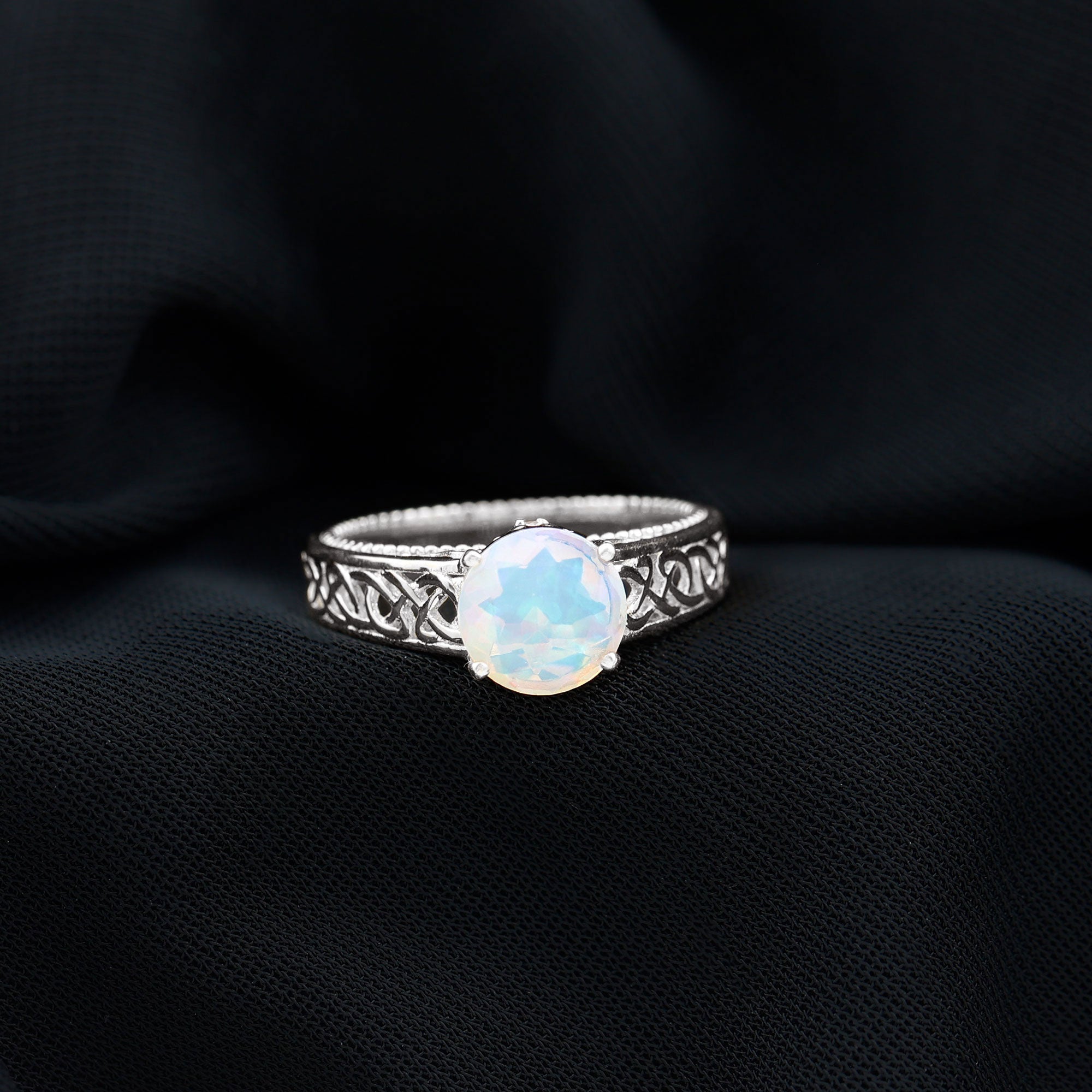 Ethiopian Opal Celtic Knot Engagement Ring with Surprise Diamond
