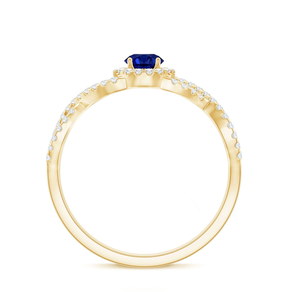 Certified 0.6 Carat Lab Grown Blue Sapphire Crossover Engagement Ring with Diamond
