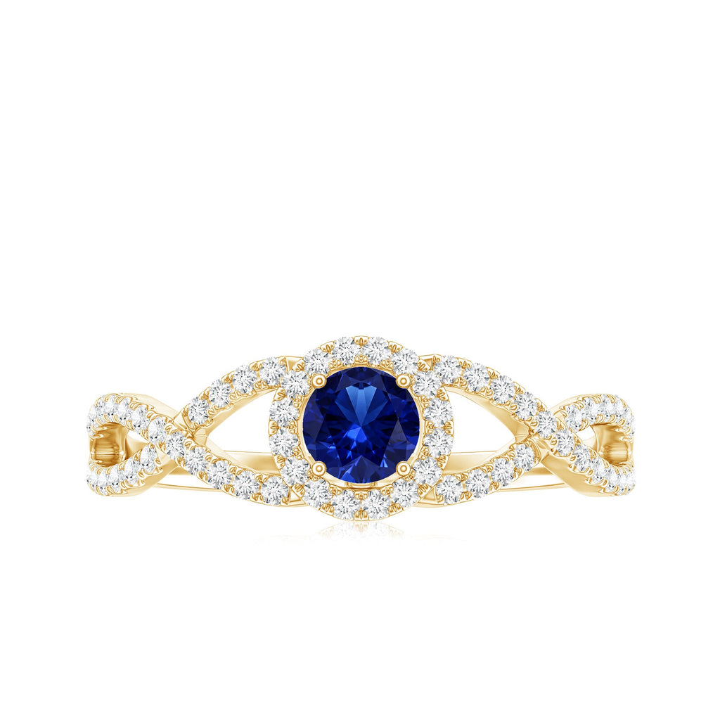 Certified 0.6 Carat Lab Grown Blue Sapphire Crossover Engagement Ring with Diamond