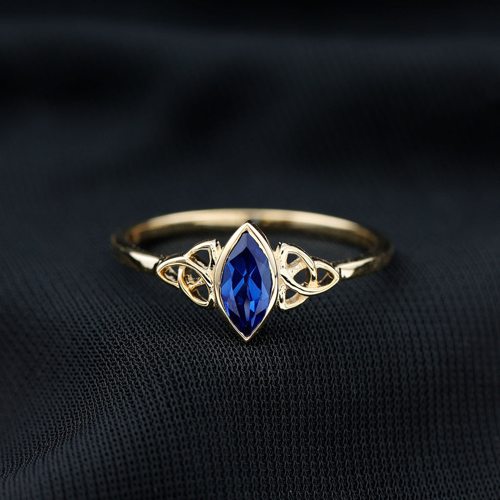 Certified Lab Grown Blue Sapphire Marquise Engagement Ring with Celtic Knot
