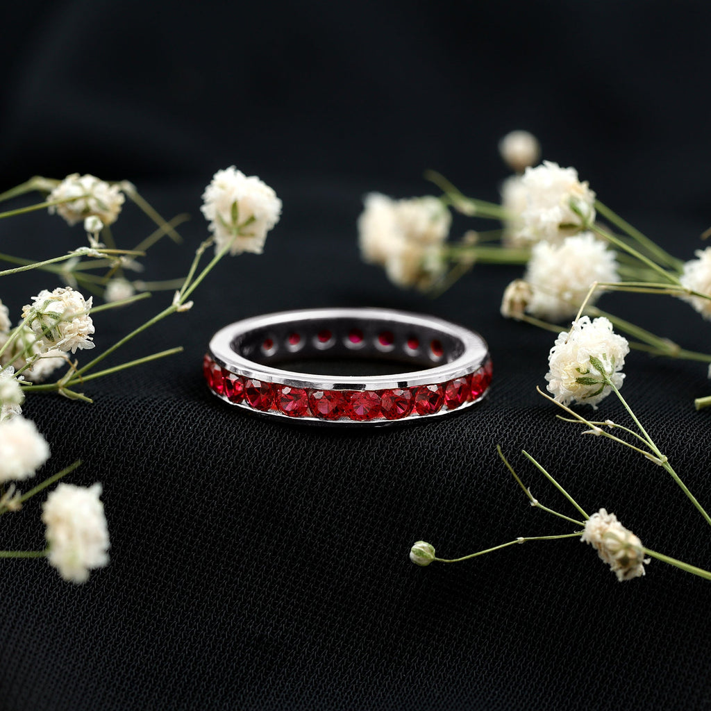 Round Created Ruby Full Eternity Ring in Channel Setting