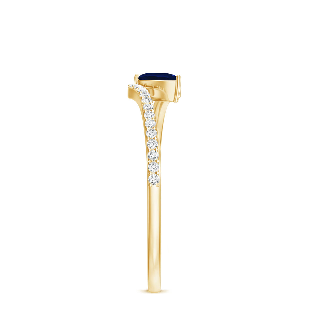 Tilted Pear Shaped Blue Sapphire Bypass Promise Ring with Diamond