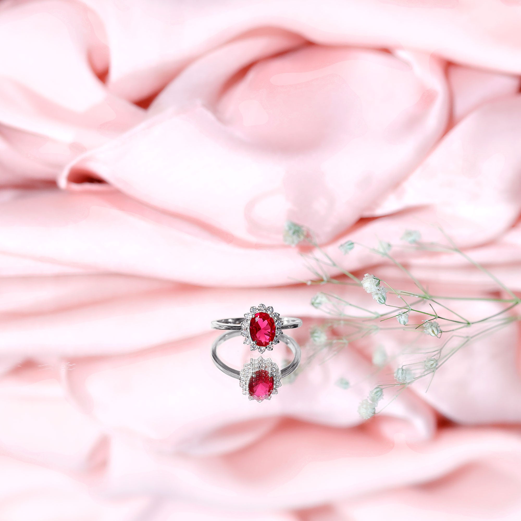 1.5 Carat Oval Shape Lab Grown Ruby and Diamond Halo Engagement Ring