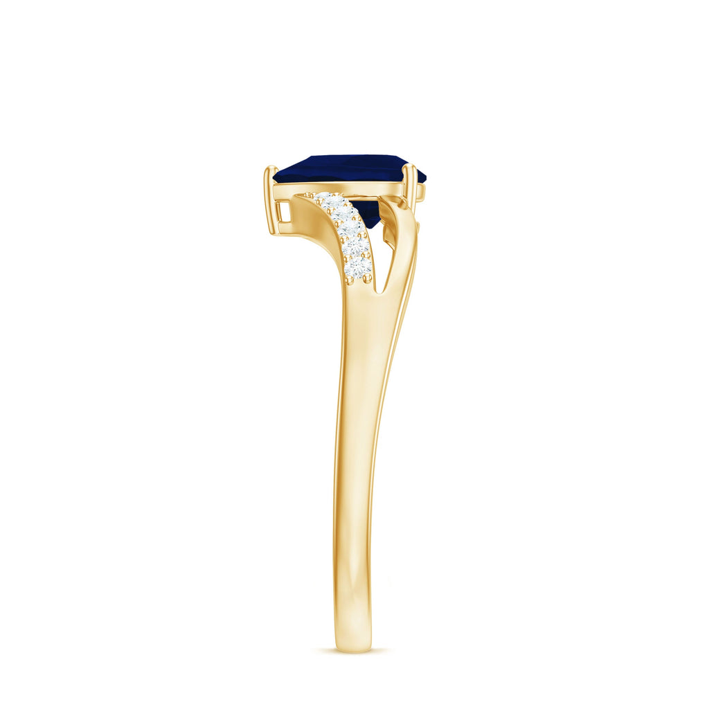 Pear Cut Solitaire Blue Sapphire Split Shank Ring with Diamond