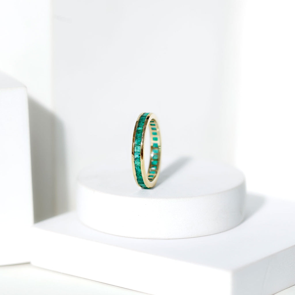 Channel Set Princess Cut Emerald Eternity Band Ring