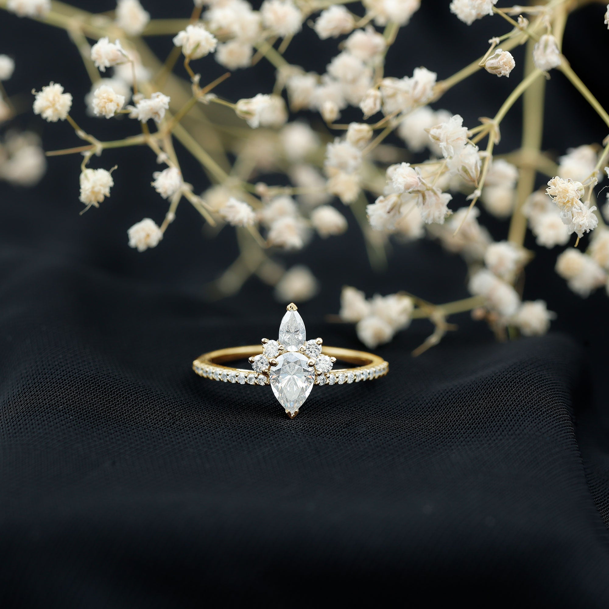 0.7 Carat Pear Shape Moissanite Crown Engagement Ring