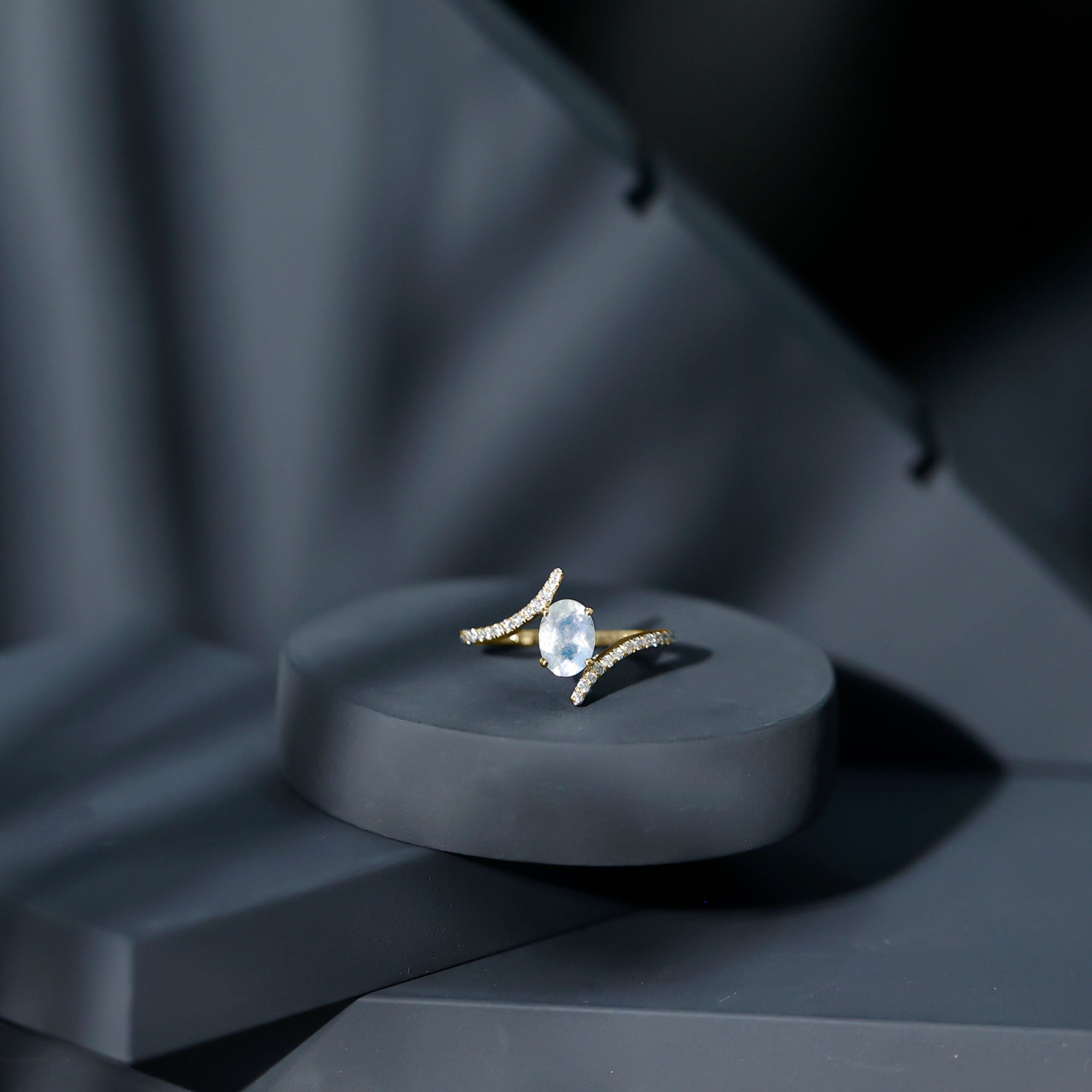 Oval Moonstone and Diamond Bypass Engagement Ring