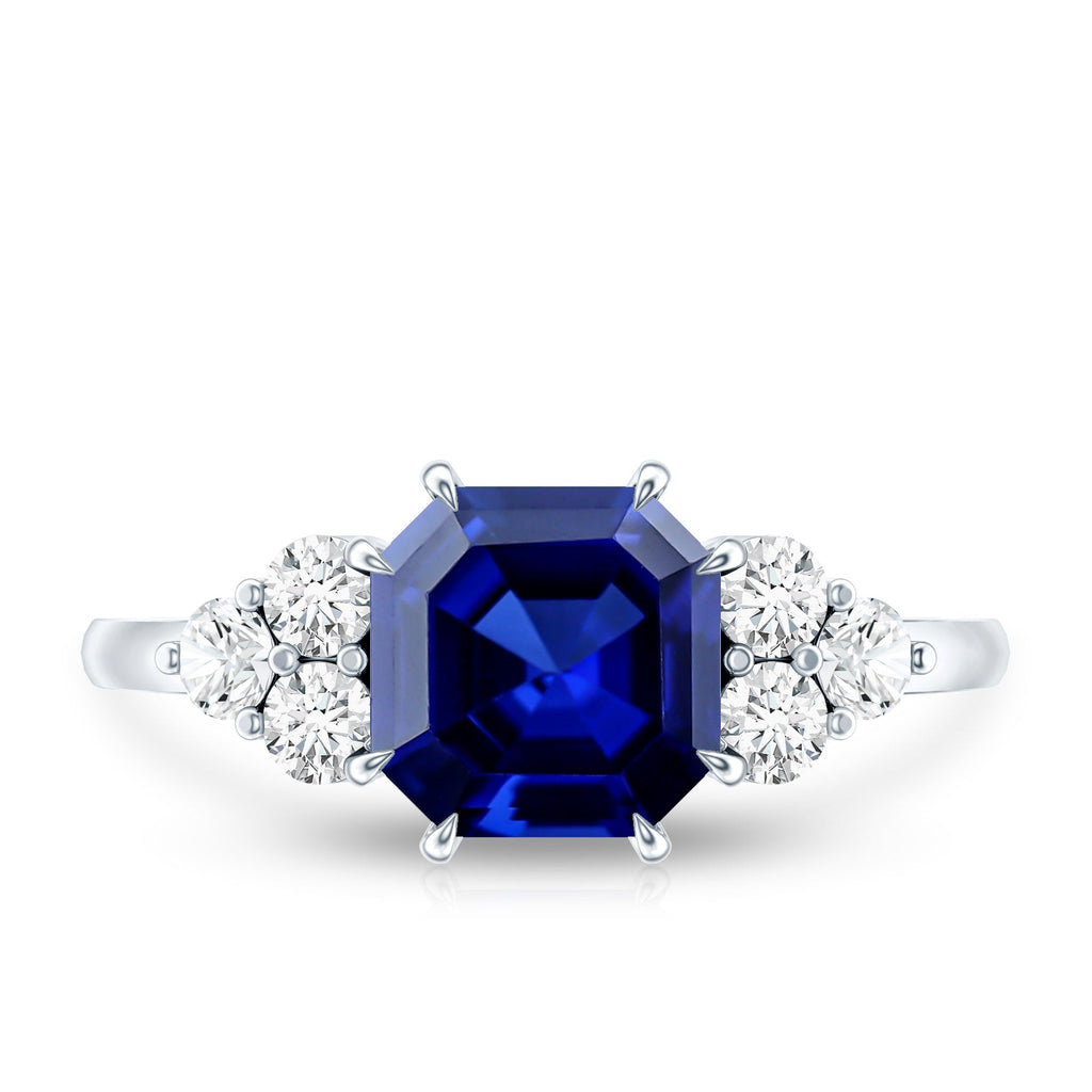 Certified 4.8 Carat Asscher Cut Lab Grown Blue Sapphire Engagement Ring with Diamond Trio