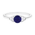 Round 0.9 Carat Blue Sapphire Engagement Ring with Diamond Trio