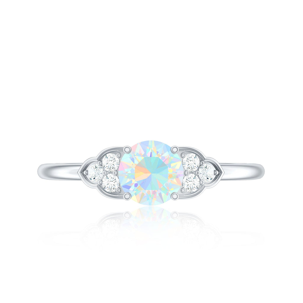 Natural Ethiopian Rainbow Opal Engagement Ring with Diamond Trio