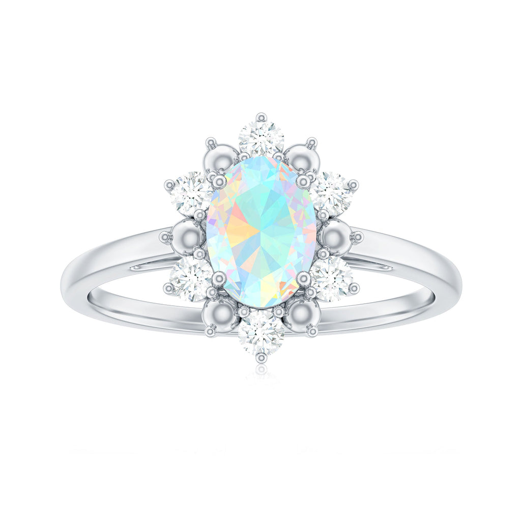 Natural 0.9 Carat Opalescent Oval Engagement Ring with Diamond Halo
