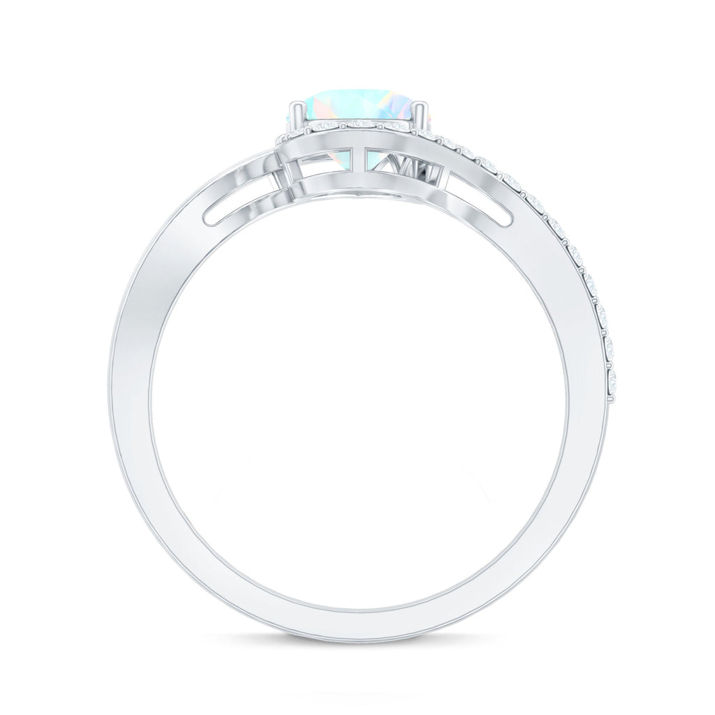 0.7 Carat Pear Cut Ethiopian Opal Engagement Ring with Diamond