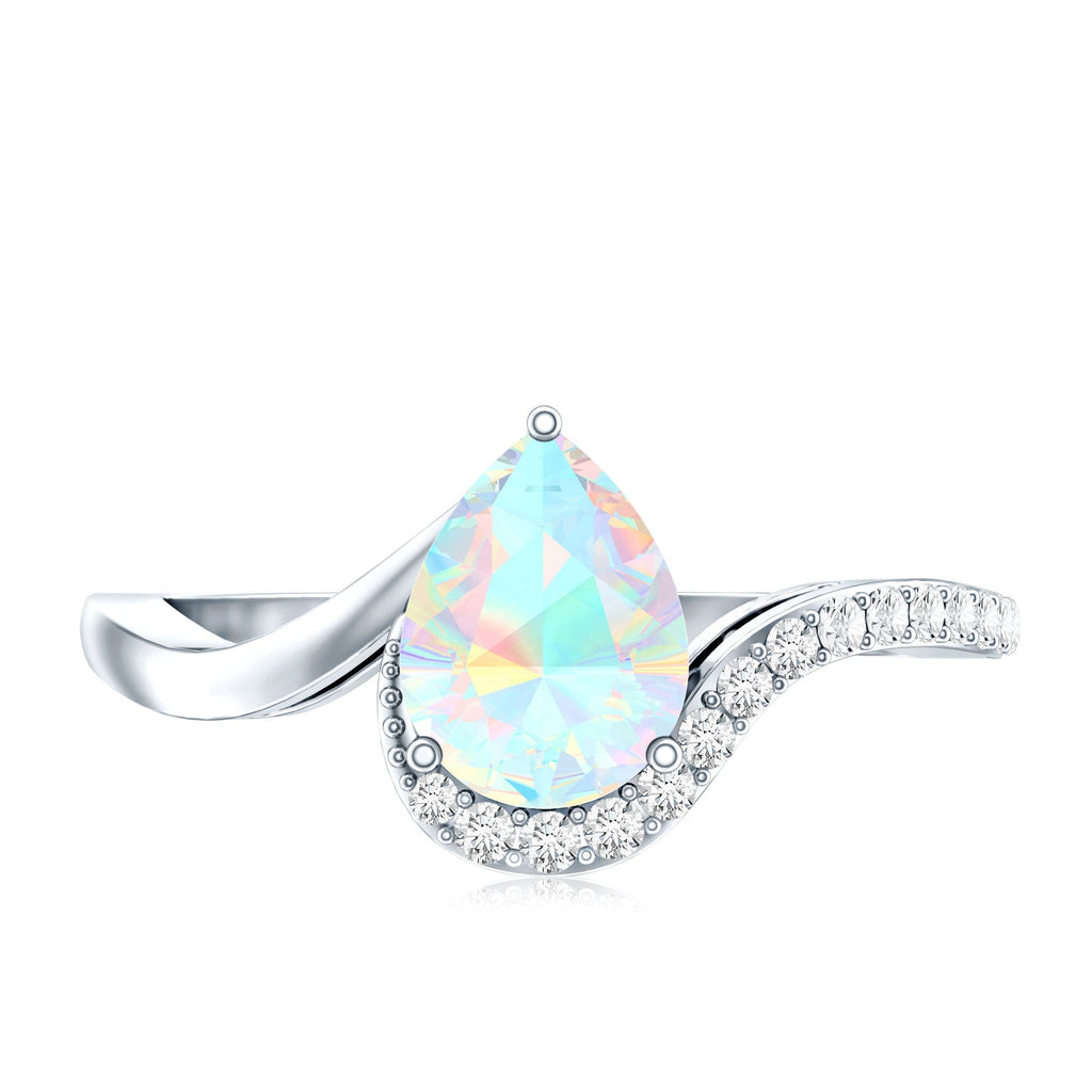 0.7 Carat Pear Cut Ethiopian Opal Engagement Ring with Diamond