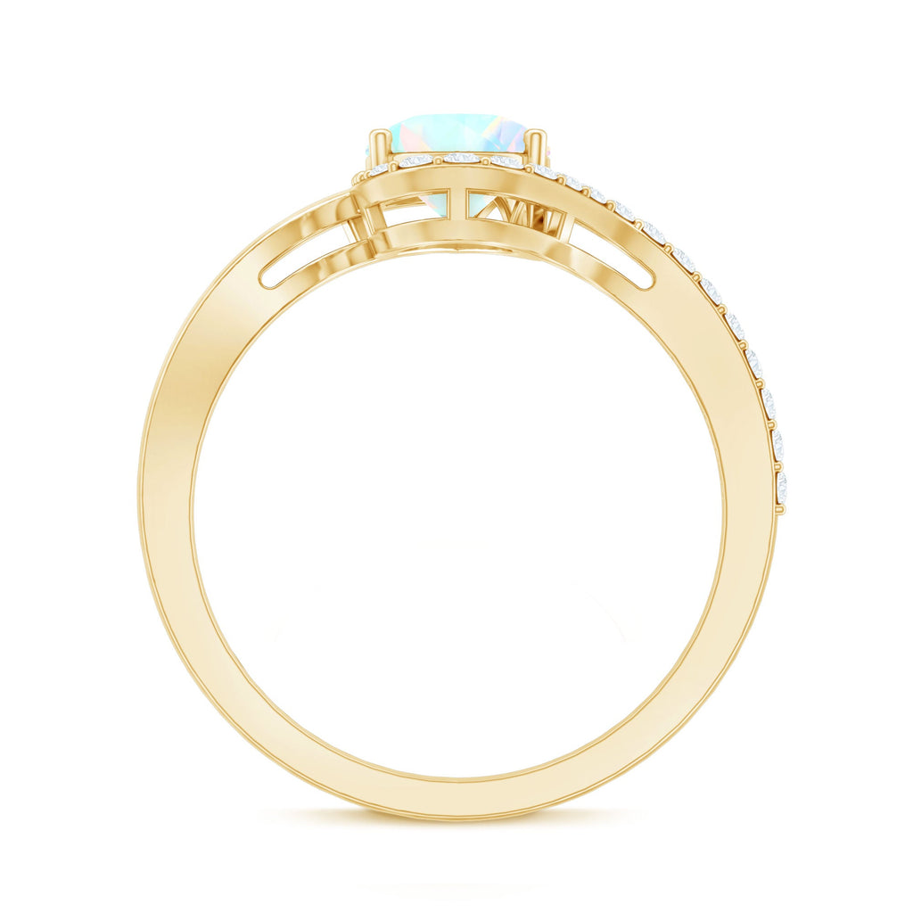 0.7 Carat Pear Cut Ethiopian Opal Engagement Ring with Diamond