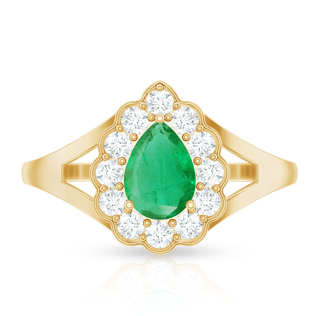 0.6 Carat Pear Cut Emerald Engagement Ring with Diamond Halo