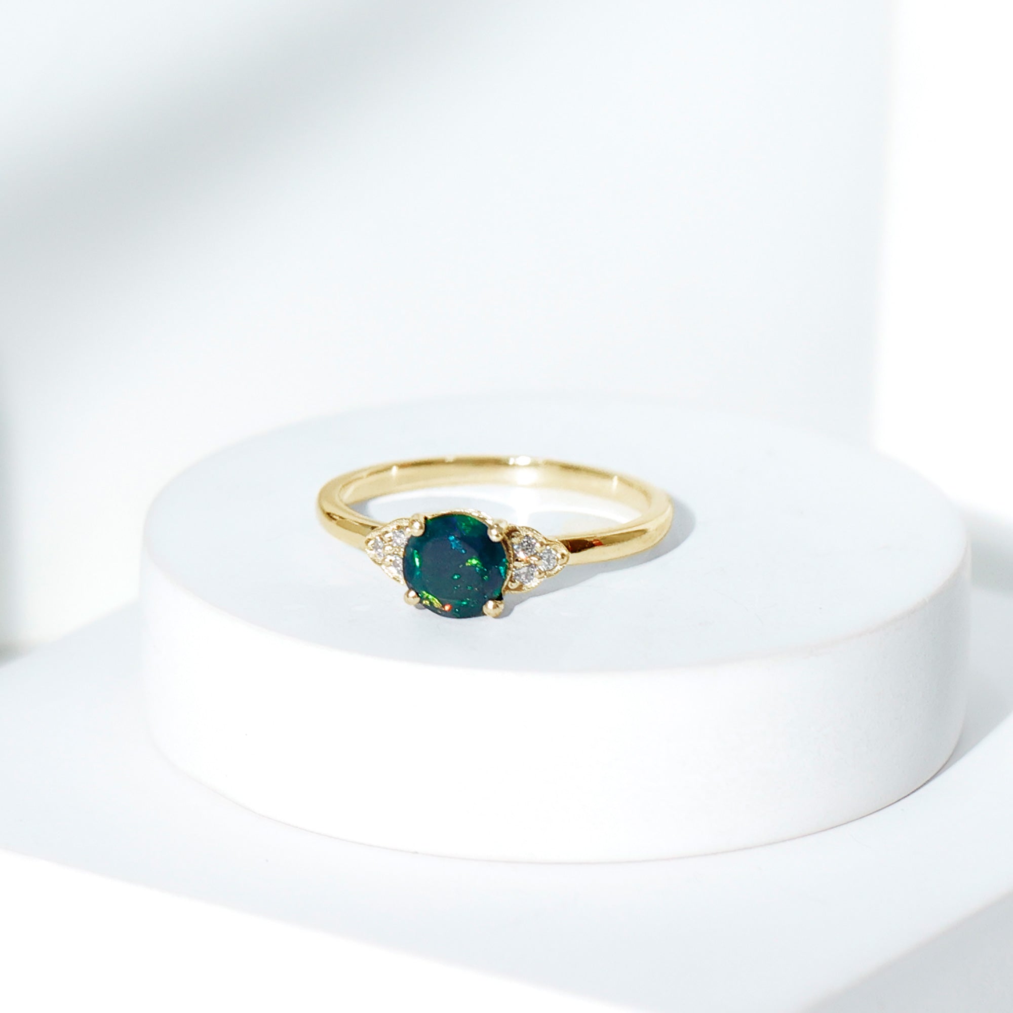 Real Black Opal Round Engagement Ring with Diamond Trio
