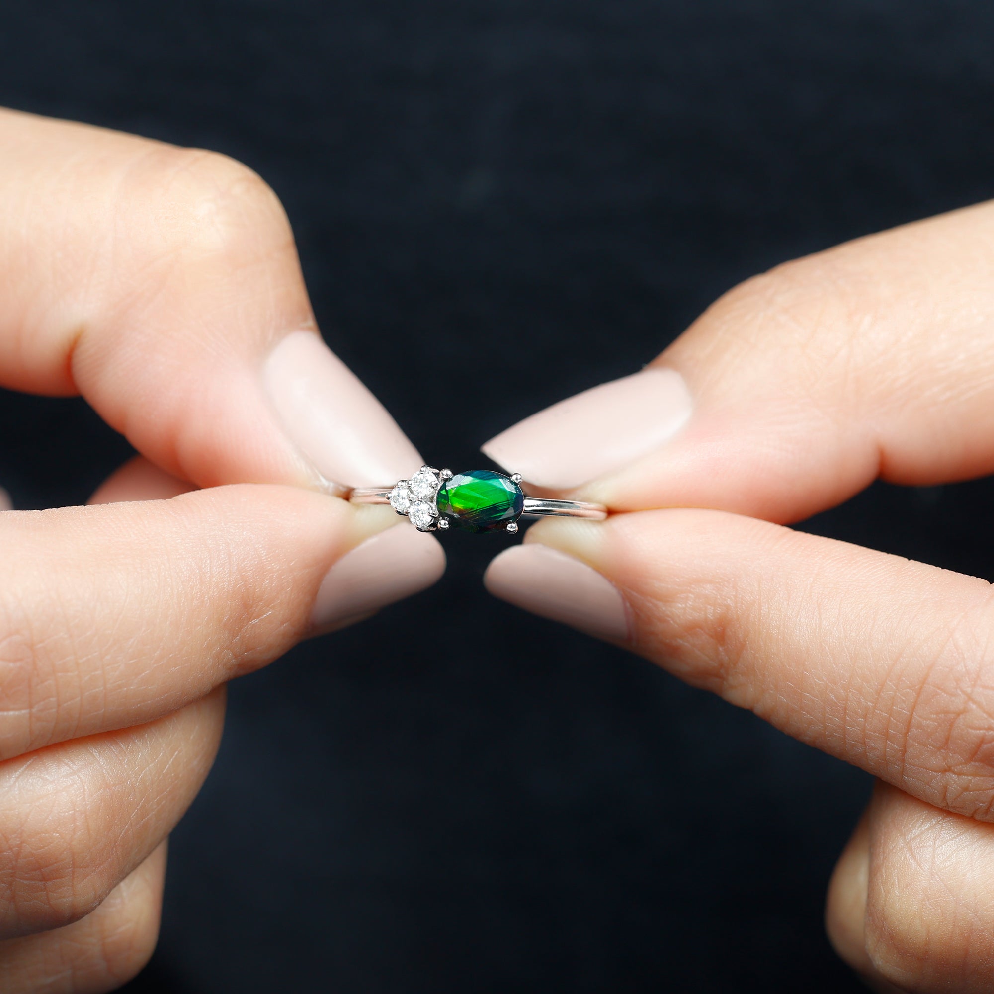 Oval Black Opal East West Ring with Diamond Trio