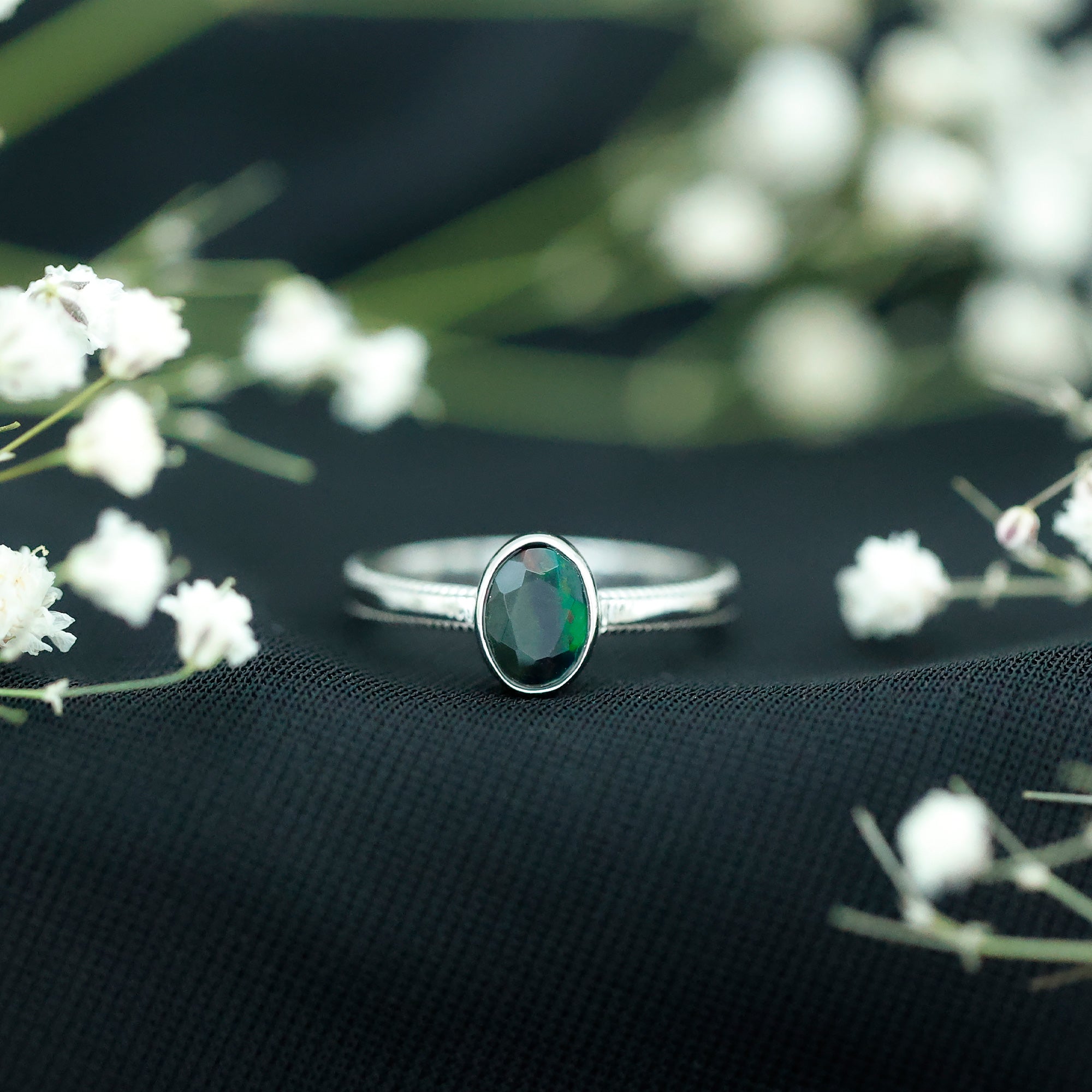 Oval Cut 0.9 Carat Black Opal Bezel Set Engagement Ring