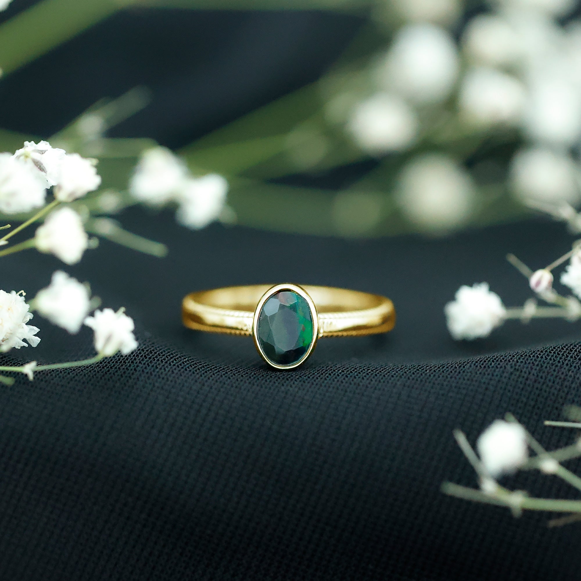 Oval Cut 0.9 Carat Black Opal Bezel Set Engagement Ring
