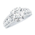 Round Brilliant Cut Moissanite Side Stone Engagement Ring