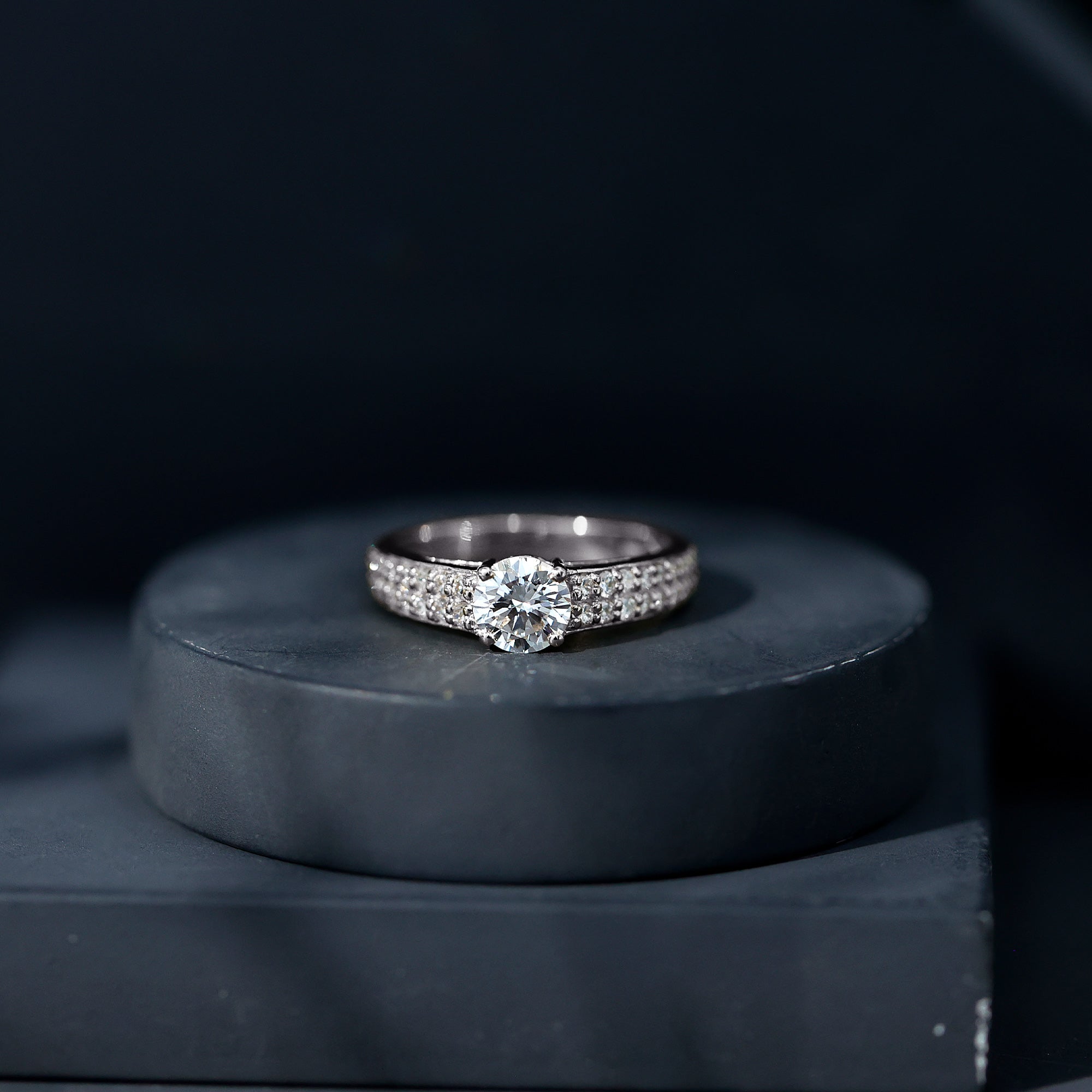Round Moissanite Engagement Ring with Side Stones