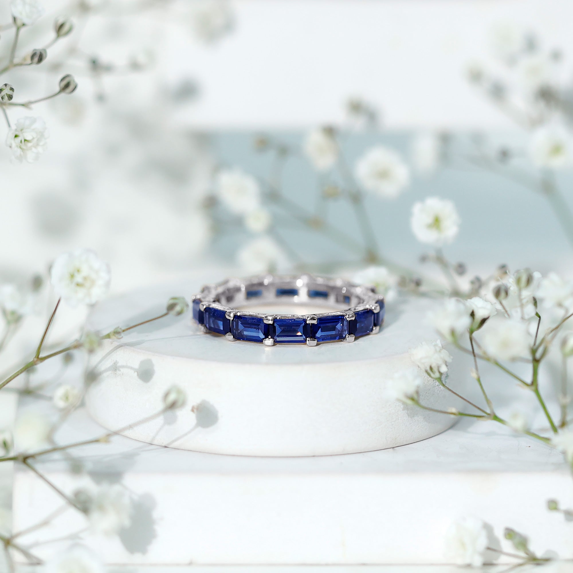 Certified Emerald Cut Lab Grown Blue Sapphire Eternity Band Ring in East West Style