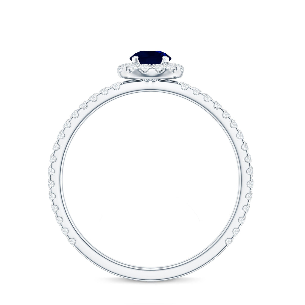 Minimal 0.9 Carat Blue Sapphire Engagement Ring with Diamond Halo