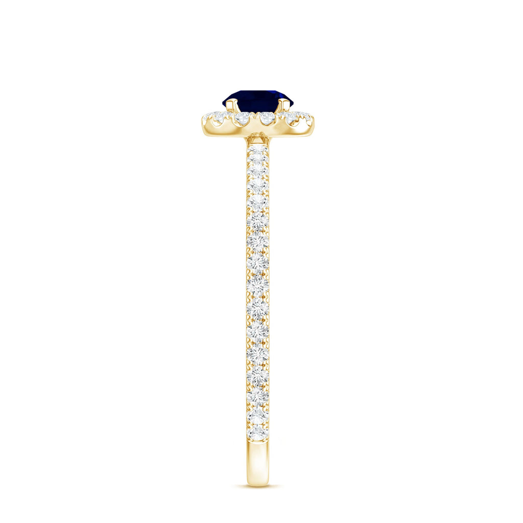 Minimal 0.9 Carat Blue Sapphire Engagement Ring with Diamond Halo
