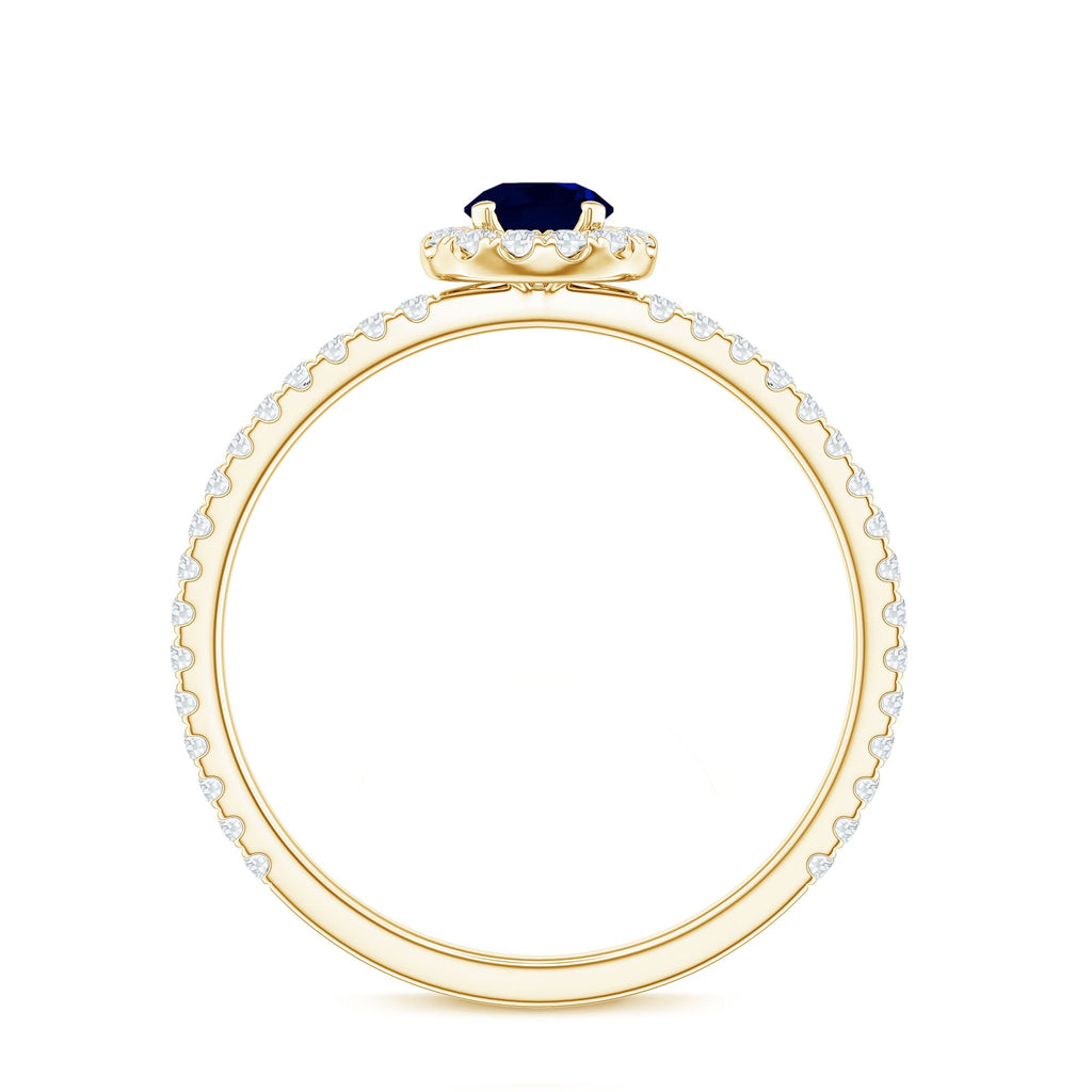 Minimal 0.9 Carat Blue Sapphire Engagement Ring with Diamond Halo