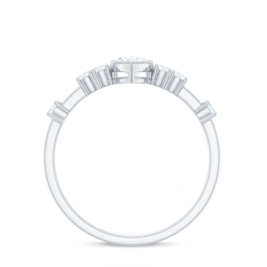 0.7 Carat Pear Cut Moissanite Solitaire Engagement Ring with Beaded Details