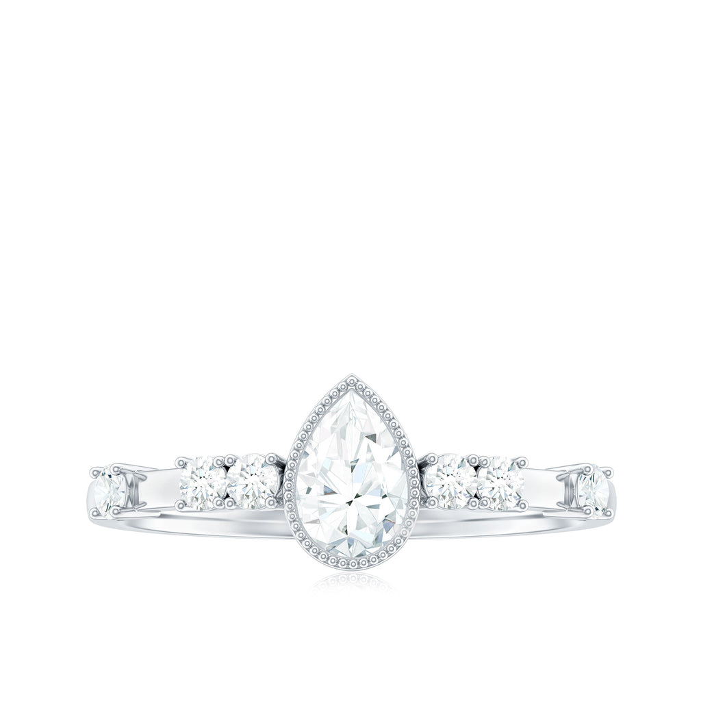 0.7 Carat Pear Cut Moissanite Solitaire Engagement Ring with Beaded Details