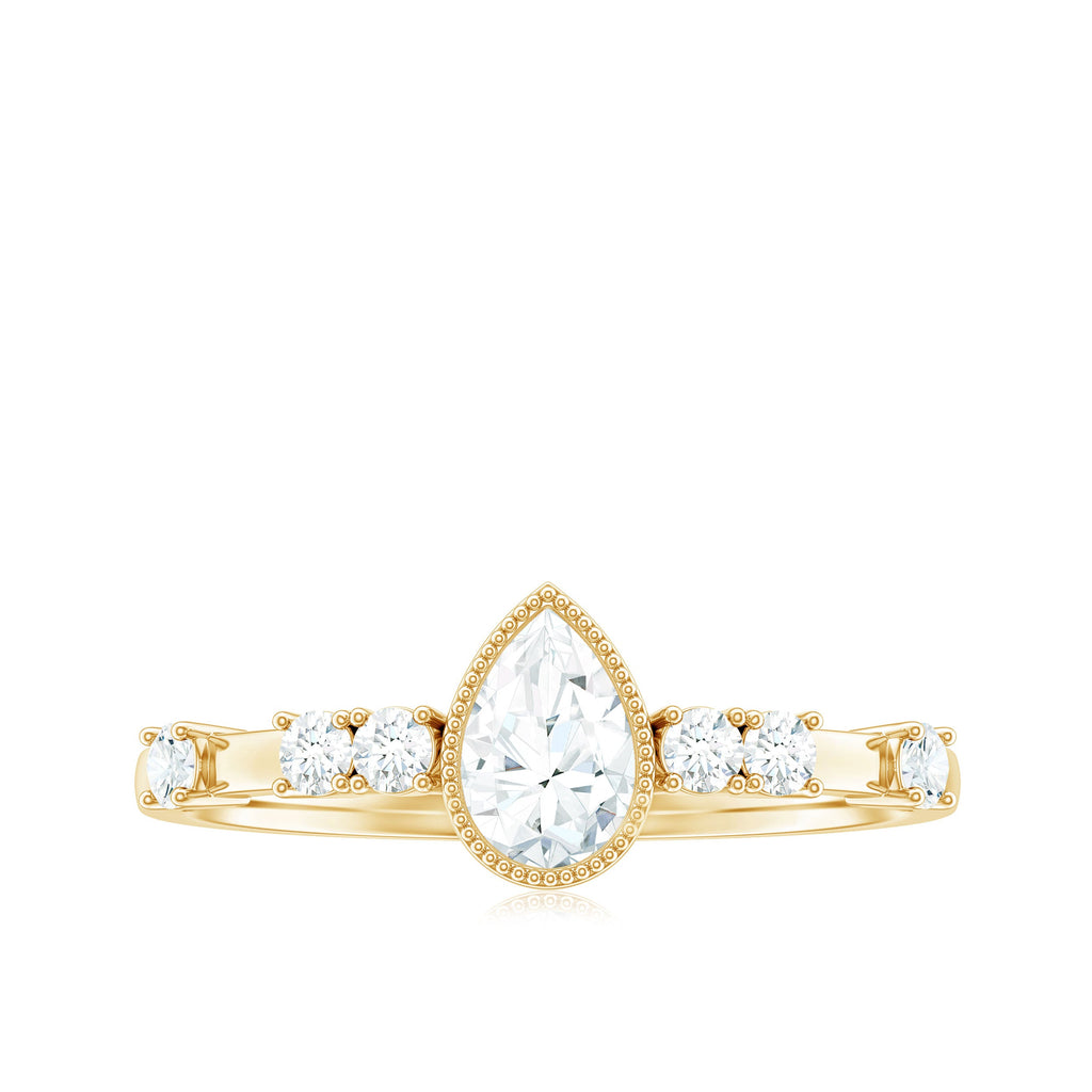 0.7 Carat Pear Cut Moissanite Solitaire Engagement Ring with Beaded Details
