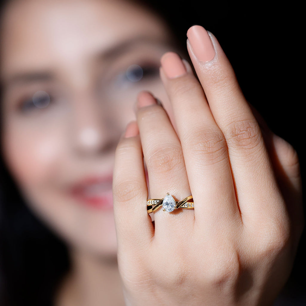 Pear Shaped Moissanite Infinity Engagement Ring