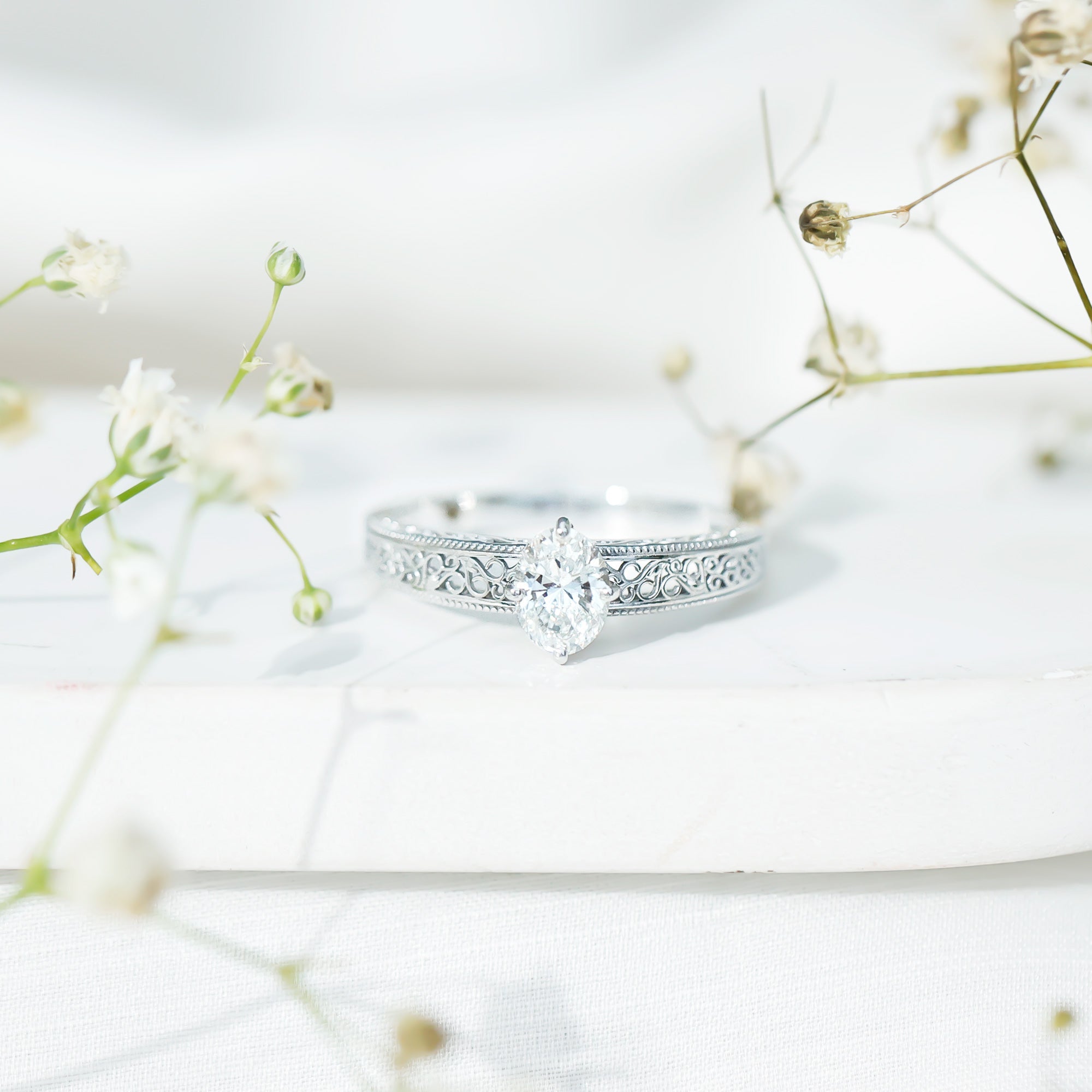 1.2 Carat Moissanite Oblong Engagement Ring with Filigree Shank
