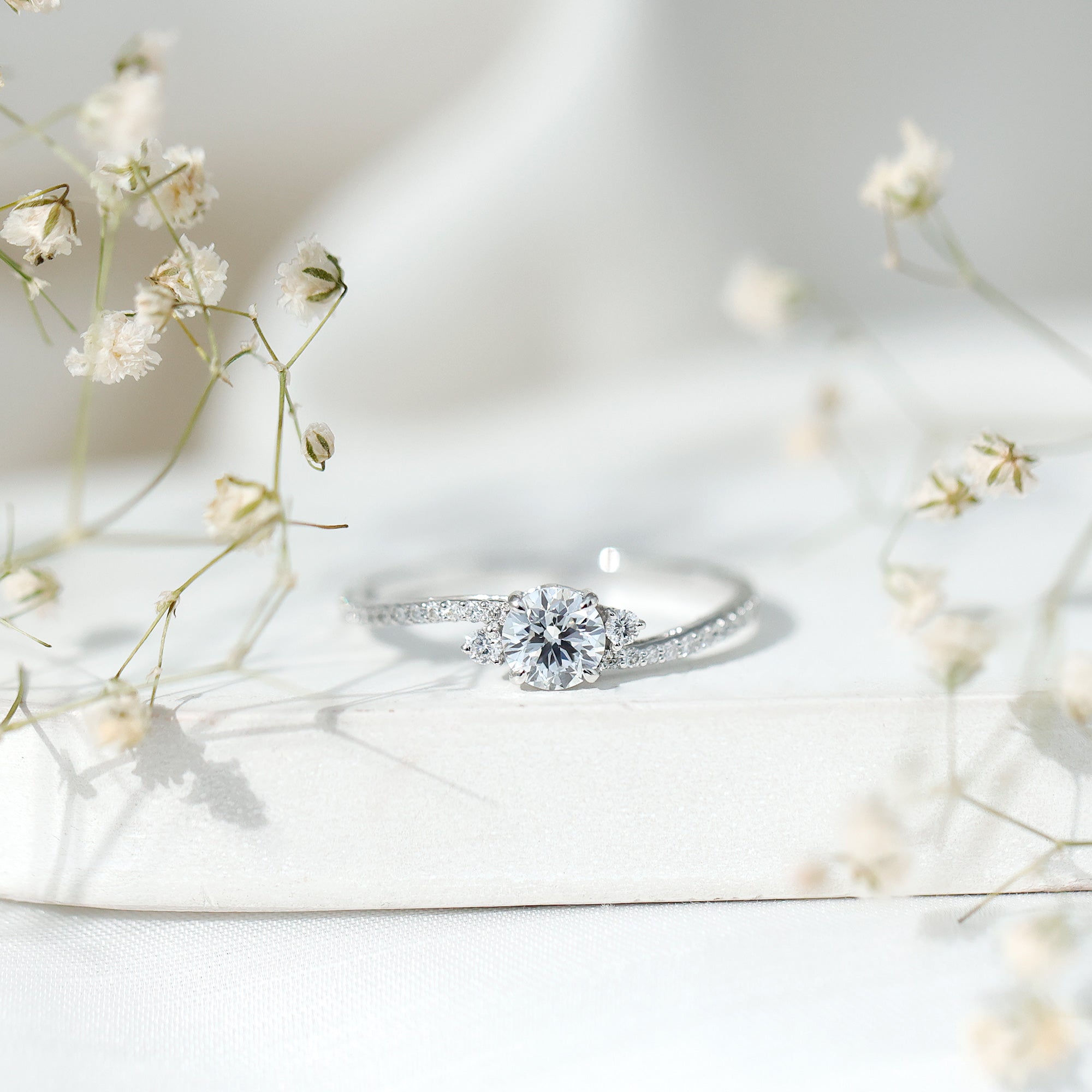 Round Shape Moissanite Bypass Engagement Ring with Side Stones