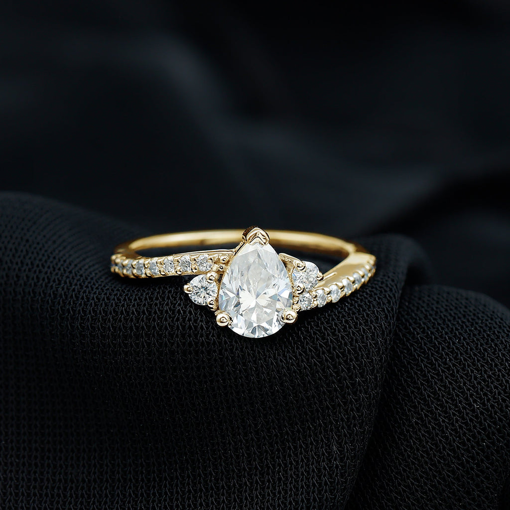 Pear Cut Moissanite Bypass Engagement Ring with Side Stones