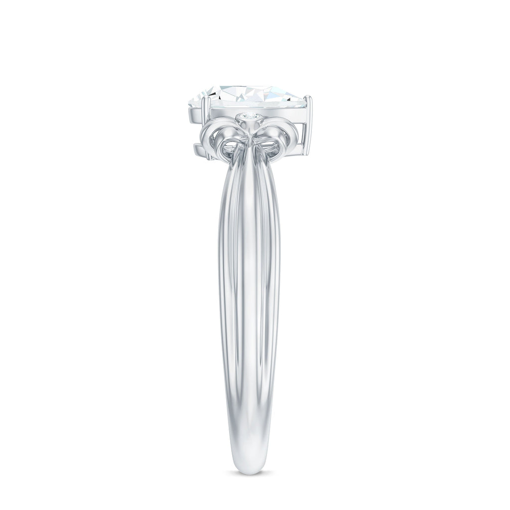 0.7 Carat Pear Shape Moissanite Bow Engagement Ring