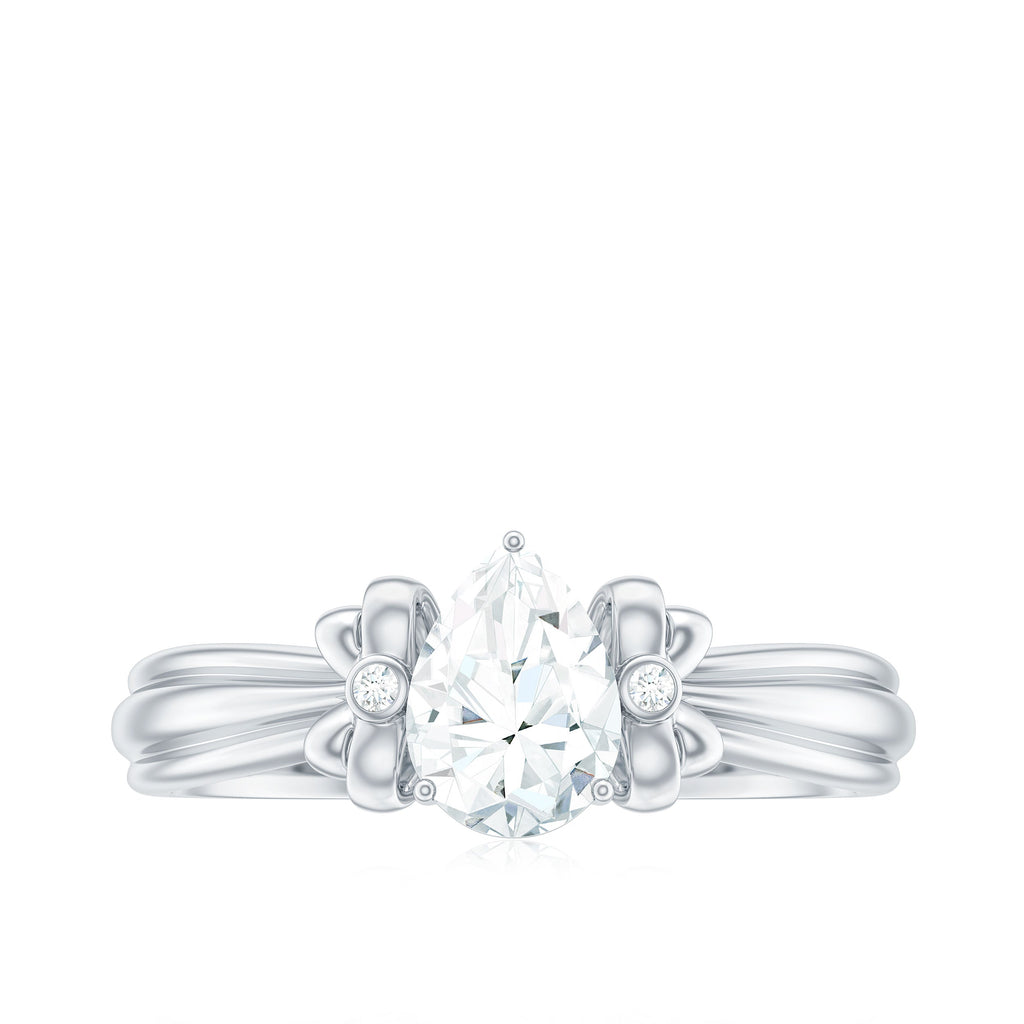 0.7 Carat Pear Shape Moissanite Bow Engagement Ring