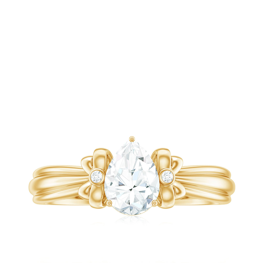 0.7 Carat Pear Shape Moissanite Bow Engagement Ring