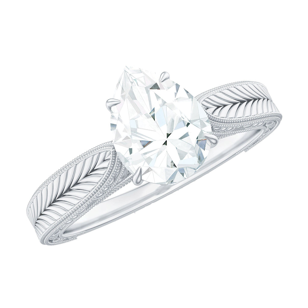 Claw Set Pear Shape Moissanite Engagement Ring