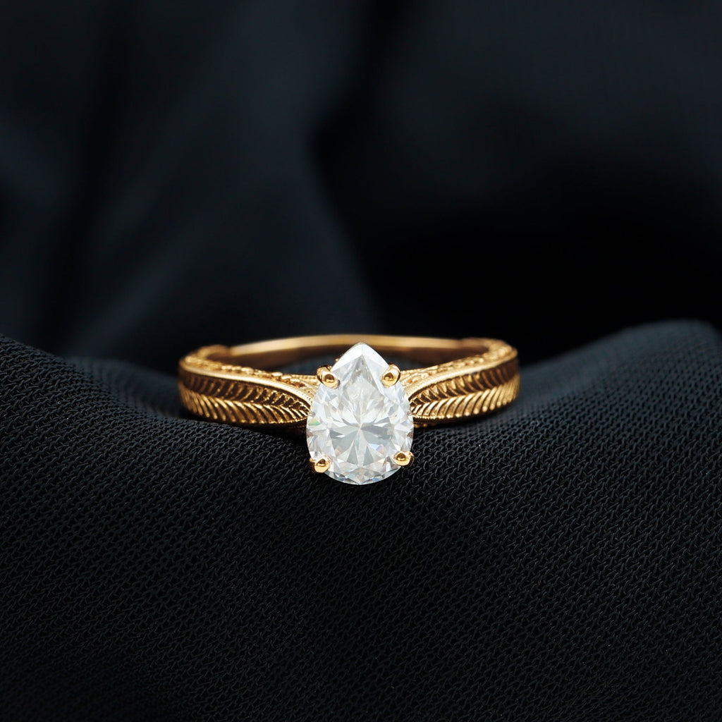 Claw Set Pear Shape Moissanite Engagement Ring
