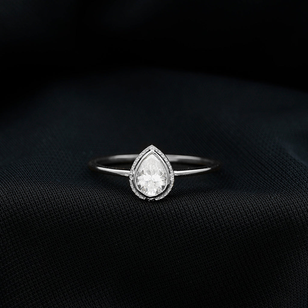 Pear Shaped Moissanite Solitaire Engagement Ring in Bezel Setting