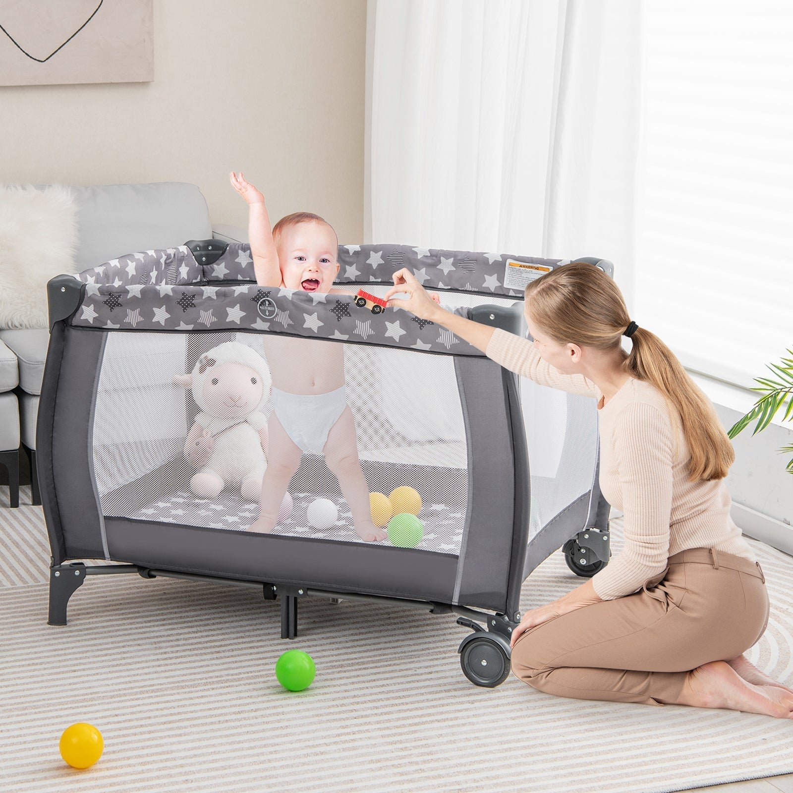 Portable Baby Playard with Changing Table Bassinet and Music Box
