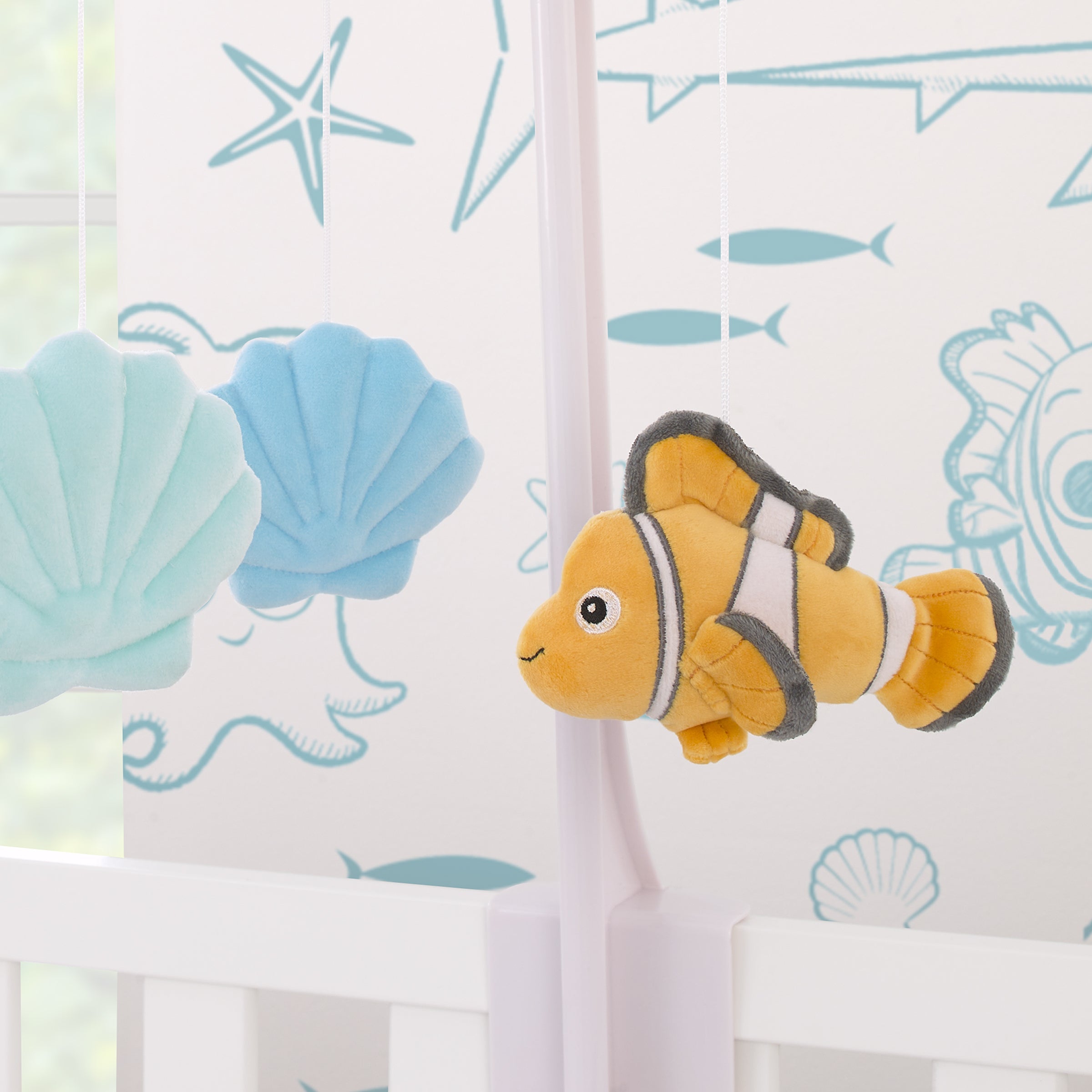 Finding Nemo Cutest Little Catch Light Blue, and Orange Plush Nemo and Seashells Musical Mobile