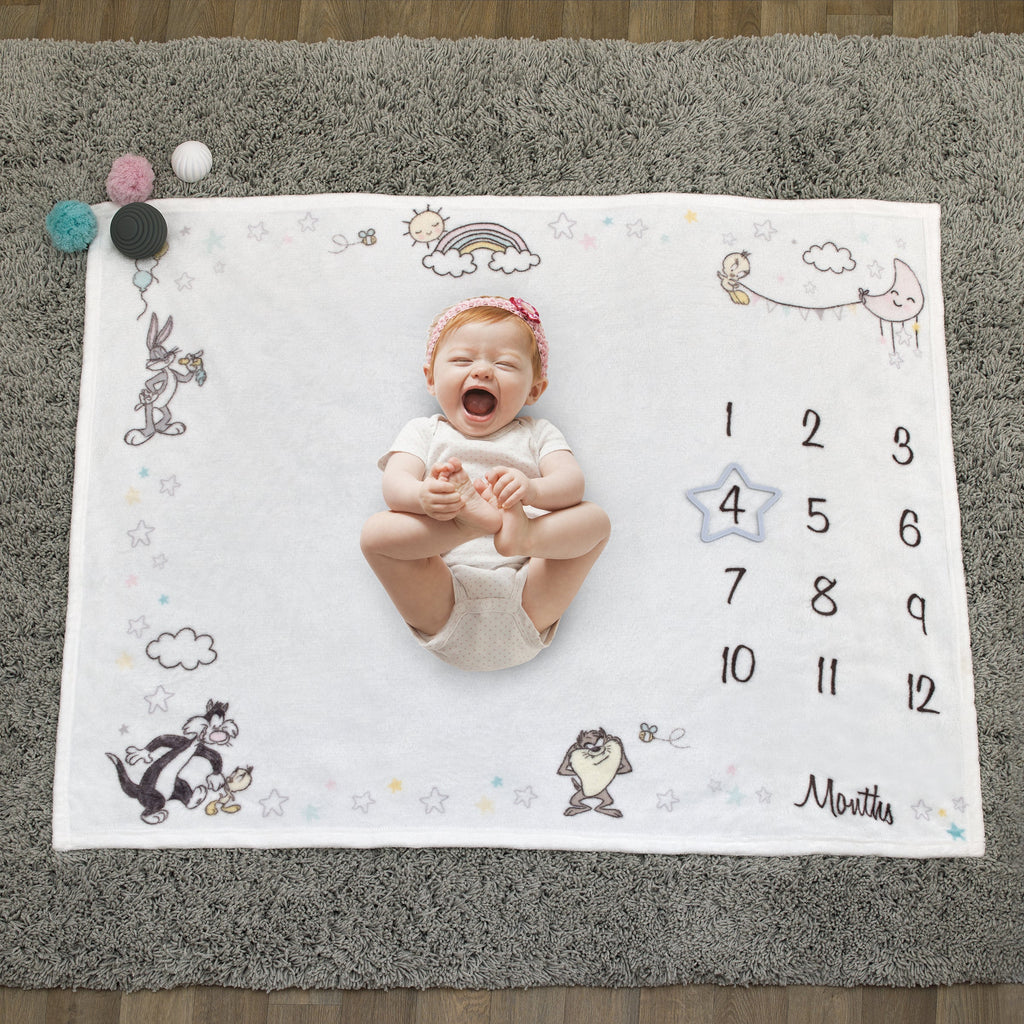 Warner Bros  Looney Tunes Best Buds White with Pastel Blue, Pink, and Yellow Bugs Bunny, Tweety, Tasmanian Devil, and Sylvester the Cat Milestone Blanket